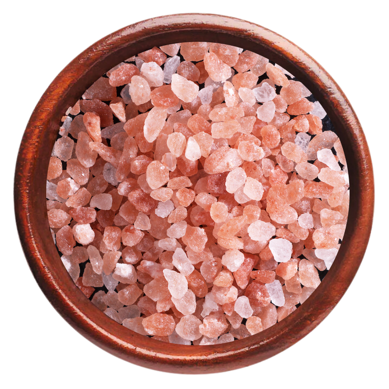 Coarse and fine pink Himalayan edible salt in a wooden bowl